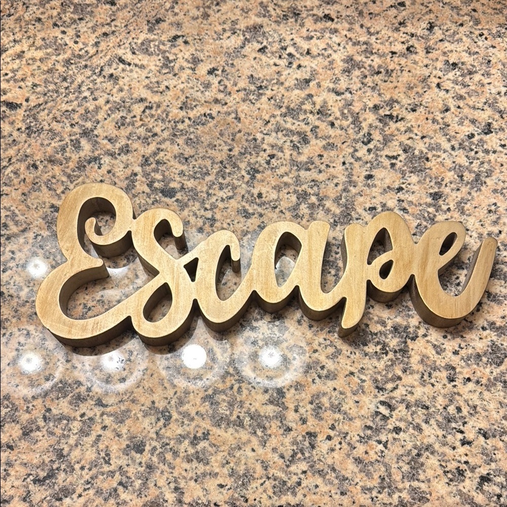 Gold “Escape” Sign